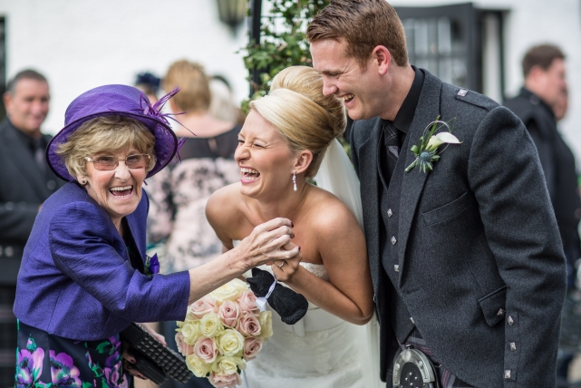 A candid photograph taken at a wedding in Marculter by Jonathan Addie, an Aberdeen based wedding photographer
