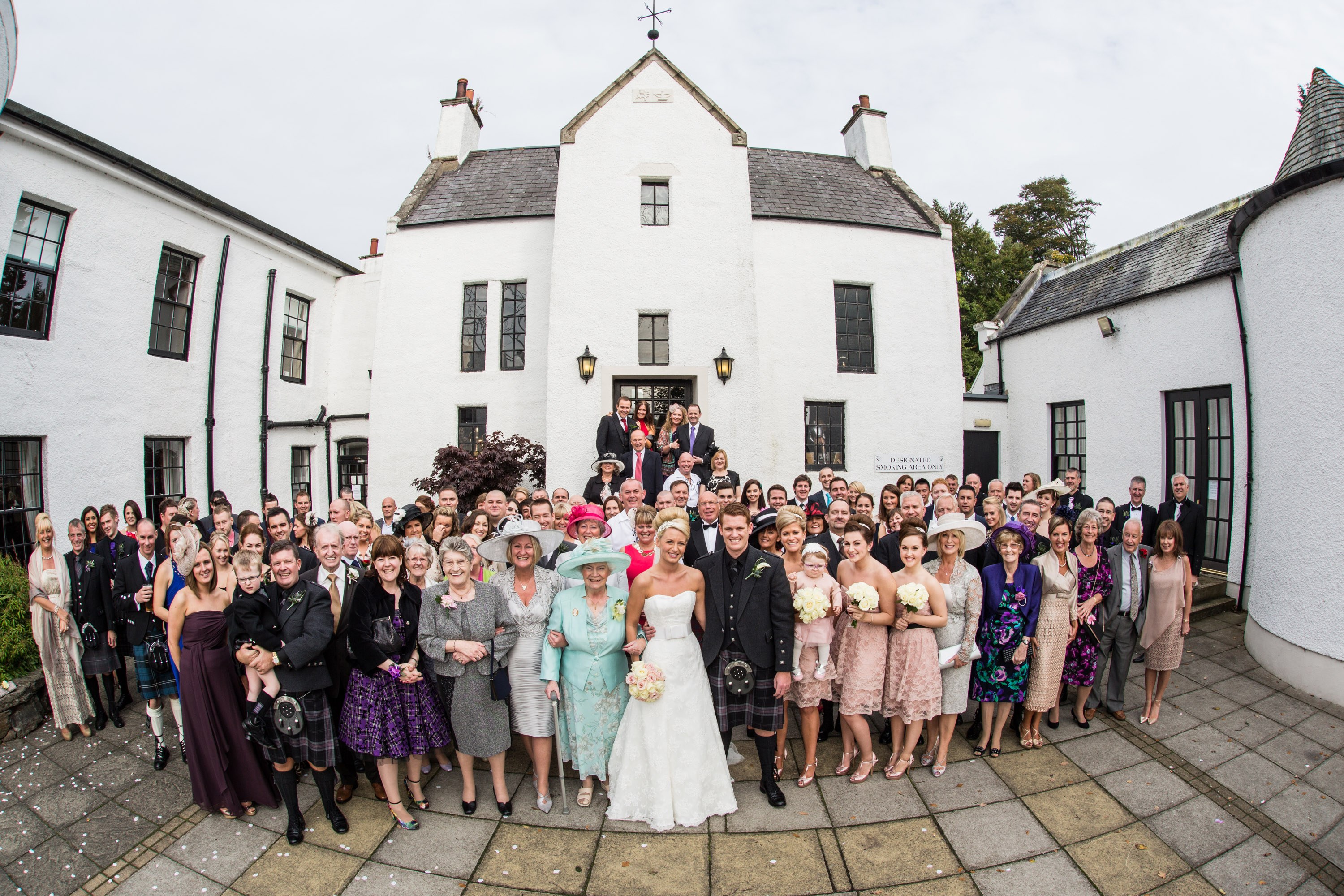 A group shot taken at a wedding in Aberdeen by Jonathan Addie, an Aberdeen based wedding photographer